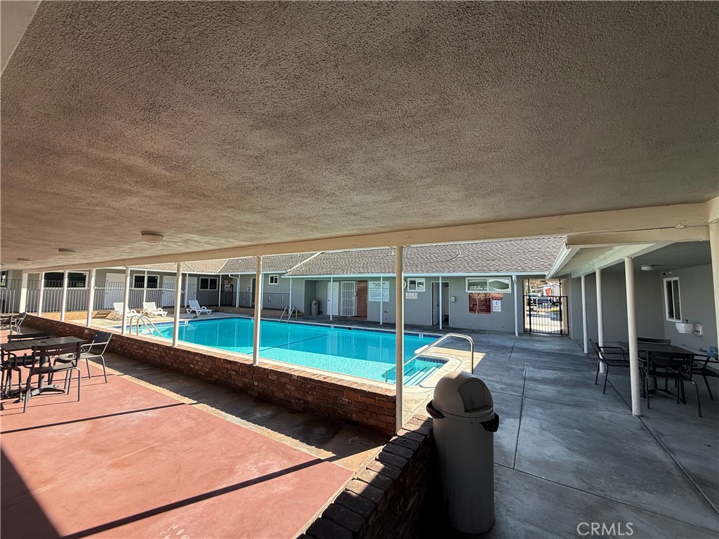 716 North Grand, Unit D3 Covina, CA 91724 - Photo 2 of 35 a view of a porch with furniture and a yard