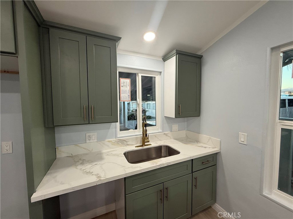 716 North Grand, Unit D3 Covina, CA 91724 - Photo 26 of 35 a kitchen with a sink and a window