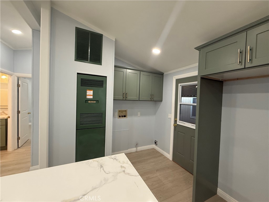 716 North Grand, Unit D3 Covina, CA 91724 - Photo 28 of 35 a bedroom with a bed and cabinets