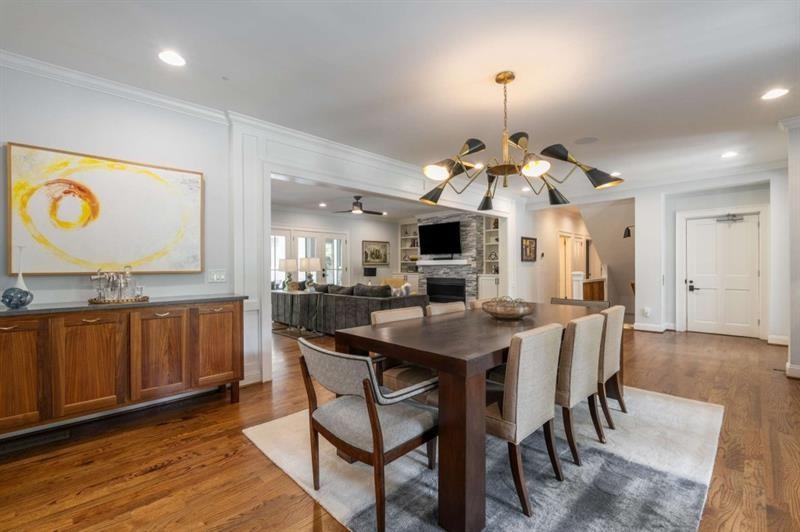 1678 Nottingham Way Northeast Atlanta, GA 30309 - Photo 13 of 57 a view of a dining room with furniture window and wooden floor