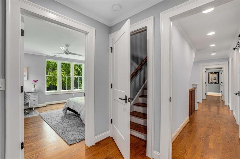 1678 Nottingham Way Northeast Atlanta, GA 30309 - Photo 29 of 57 a living room with furniture and a large window
