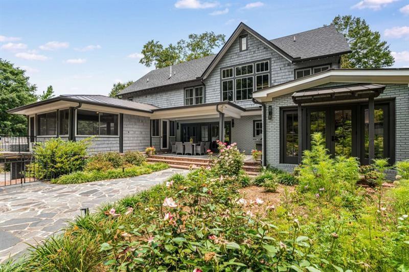 1678 Nottingham Way Northeast Atlanta, GA 30309 - Photo 42 of 57 a front view of a house with a yard