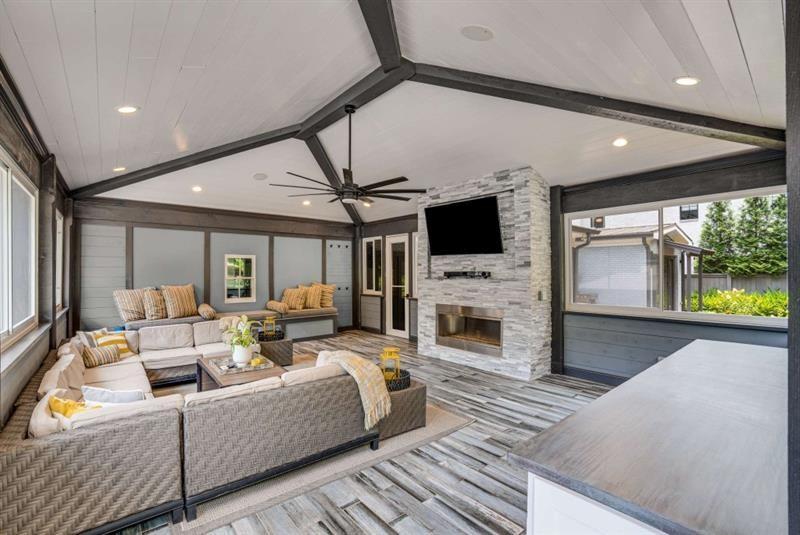 1678 Nottingham Way Northeast Atlanta, GA 30309 - Photo 44 of 57 a living room with fireplace furniture and a flat screen tv