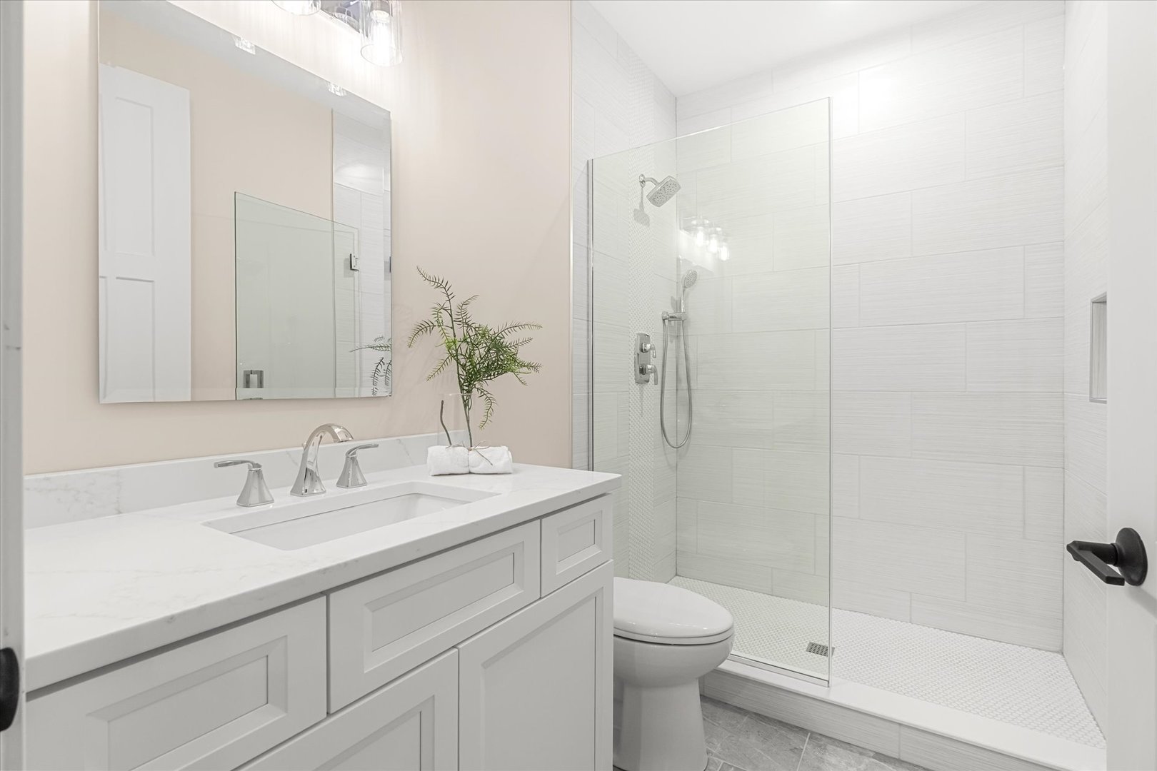 520 North Sleight Street Naperville, IL 60563 - Photo 16 of 51 a bathroom with a sink a toilet and shower