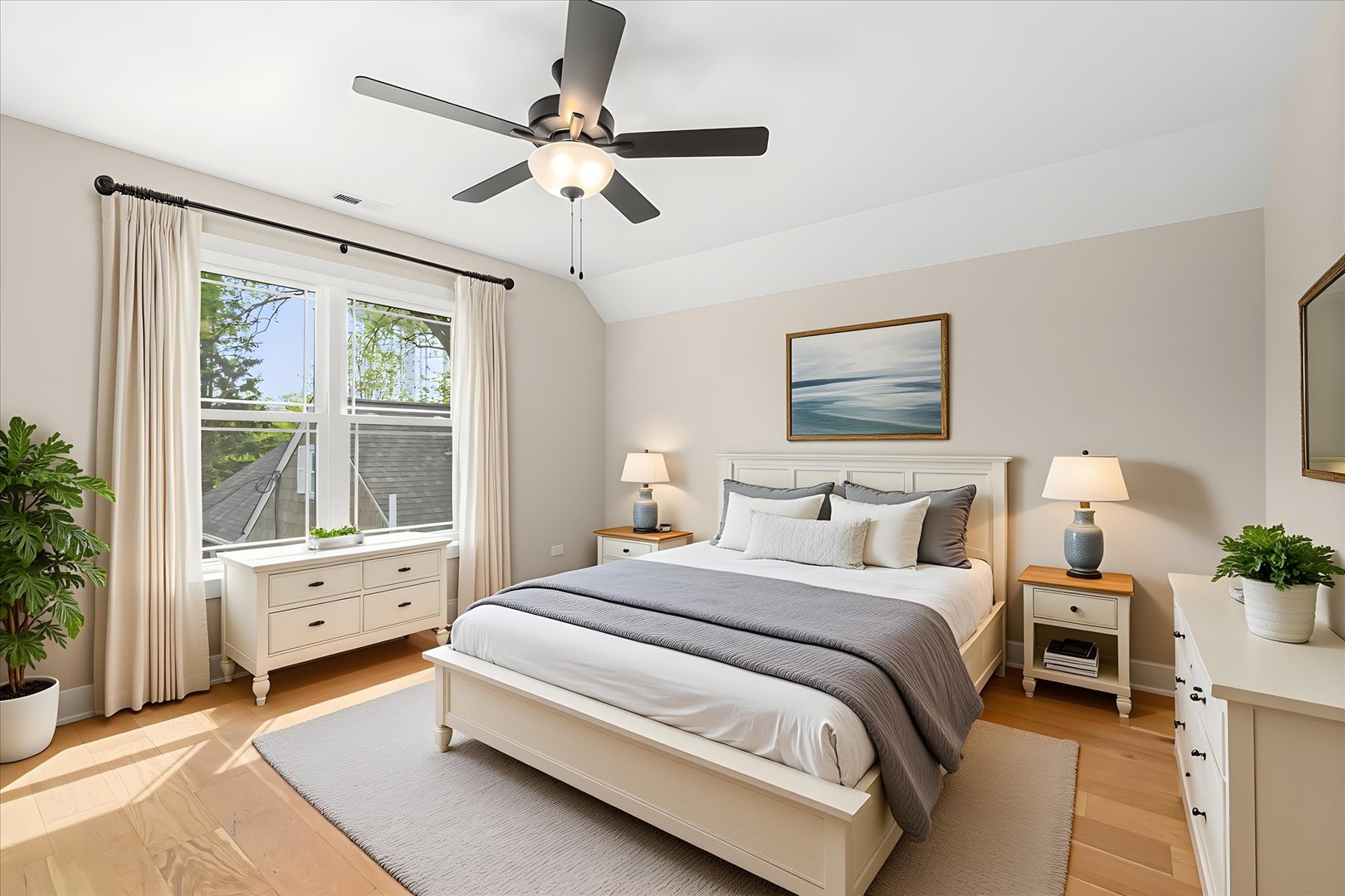 520 North Sleight Street Naperville, IL 60563 - Photo 38 of 51 a spacious bedroom with a bed a window and a chandelier