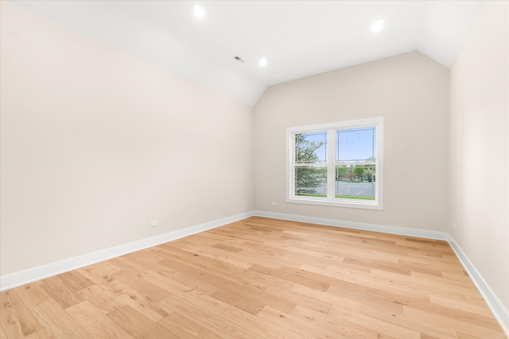 520 North Sleight Street Naperville, IL 60563 - Photo 42 of 51 an empty room with wooden floor and windows