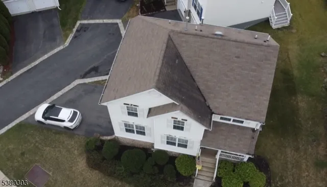 a view of outdoor kitchen with seating area