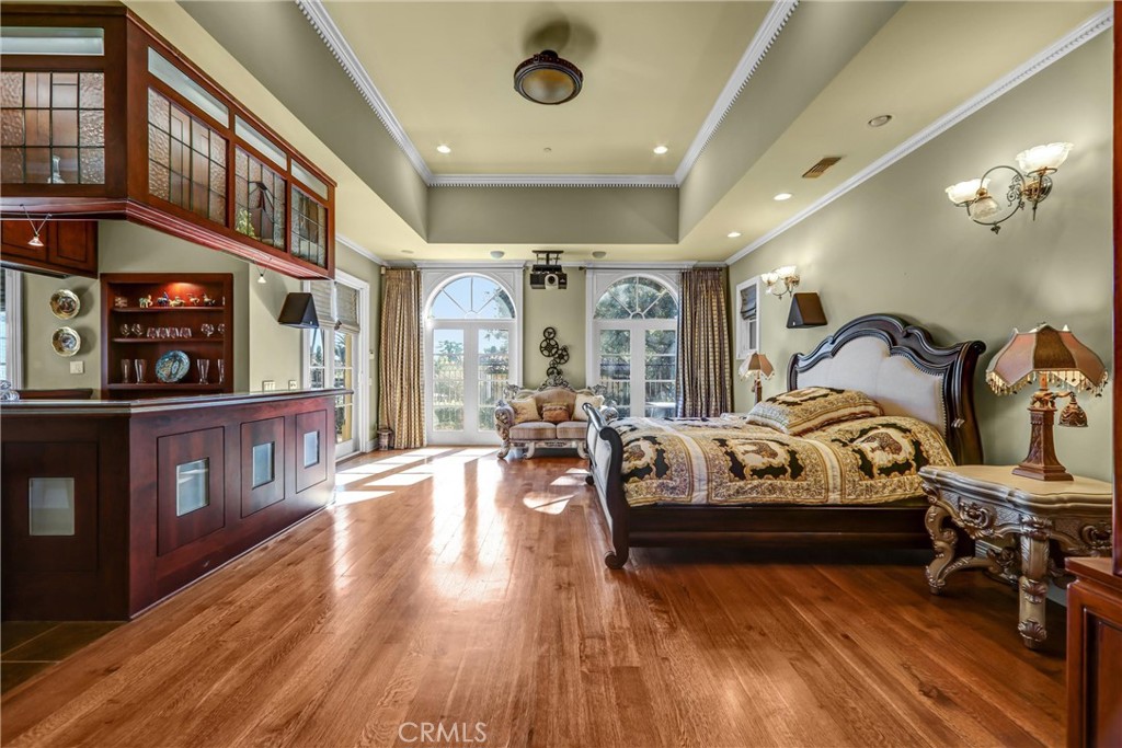 900 Fallen Leaf Road Arcadia, CA 91006 - Photo 25 of 51 a bedroom with furniture and wooden floor