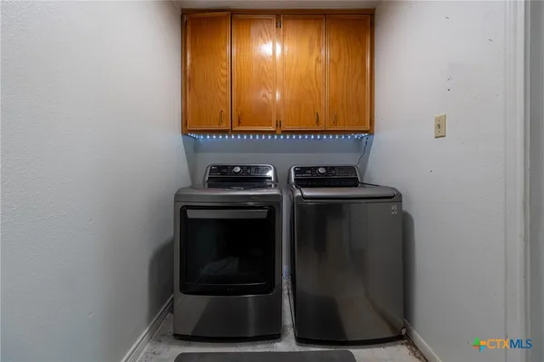 a view of storage and utility room
