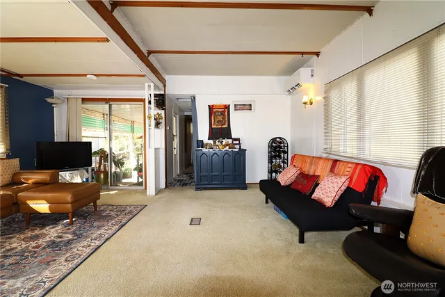 a living room with furniture and a couch