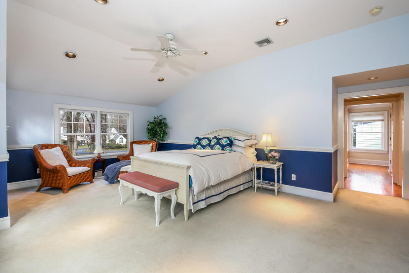 2 Meadowbrook Road Darien, CT 06820 - Photo 22 of 36 a bedroom with a bed and a couch