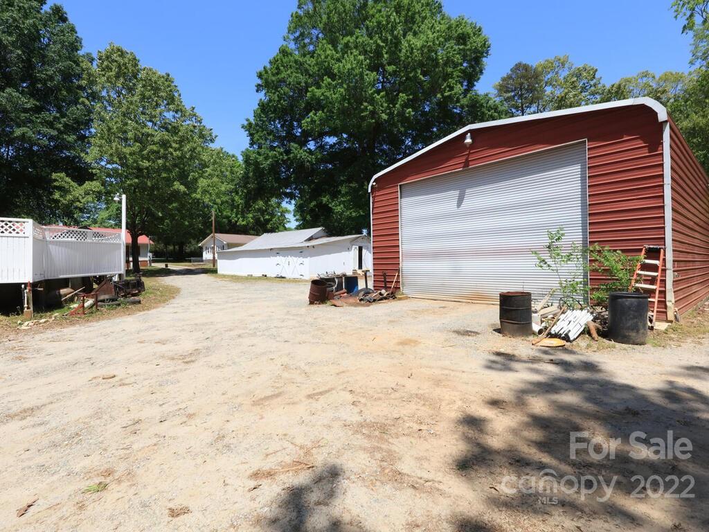 132 Mt Mourne Loop Mooresville, NC 28117 - Photo 14 of 17 a view of backyard of house