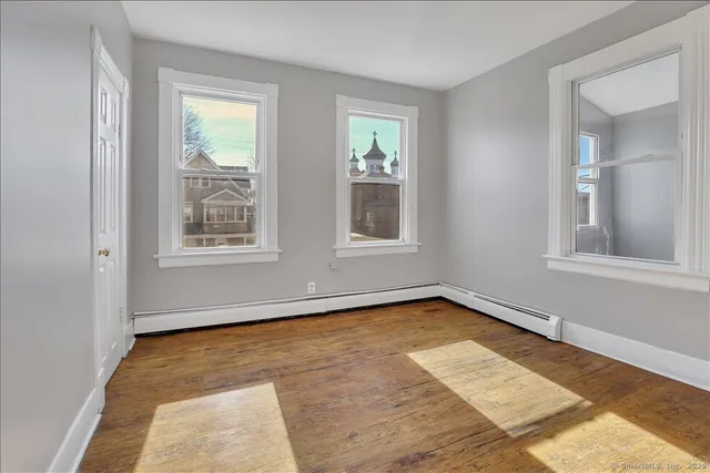 an empty room with windows