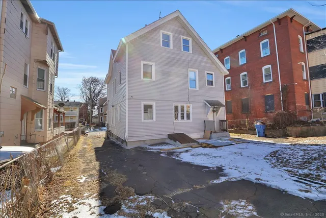 a view of a building with a street