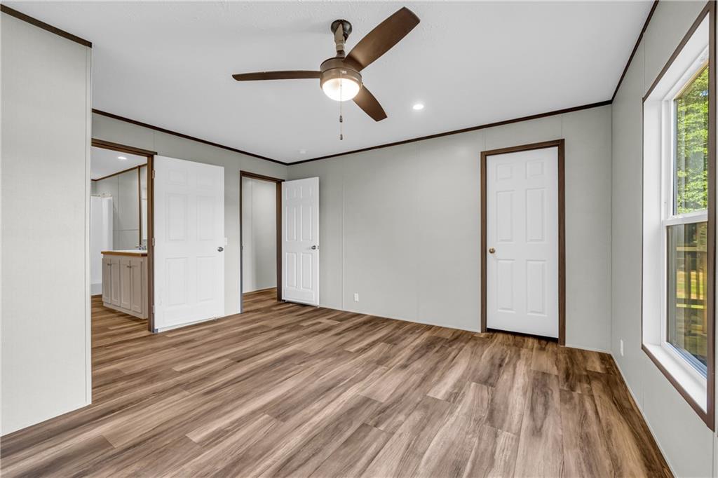 3078 Anderson Highway Hartwell, GA 30643 - Photo 28 of 37 a view of empty room with wooden floor and fan