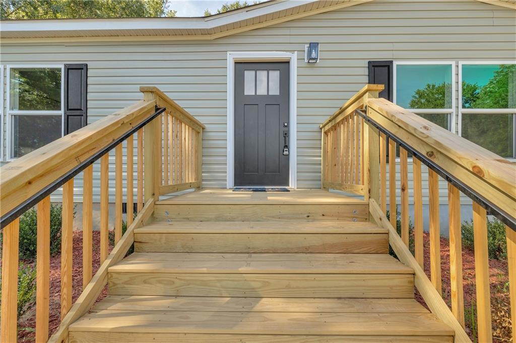 3078 Anderson Highway Hartwell, GA 30643 - Photo 3 of 37 a view of house with wooden stairs