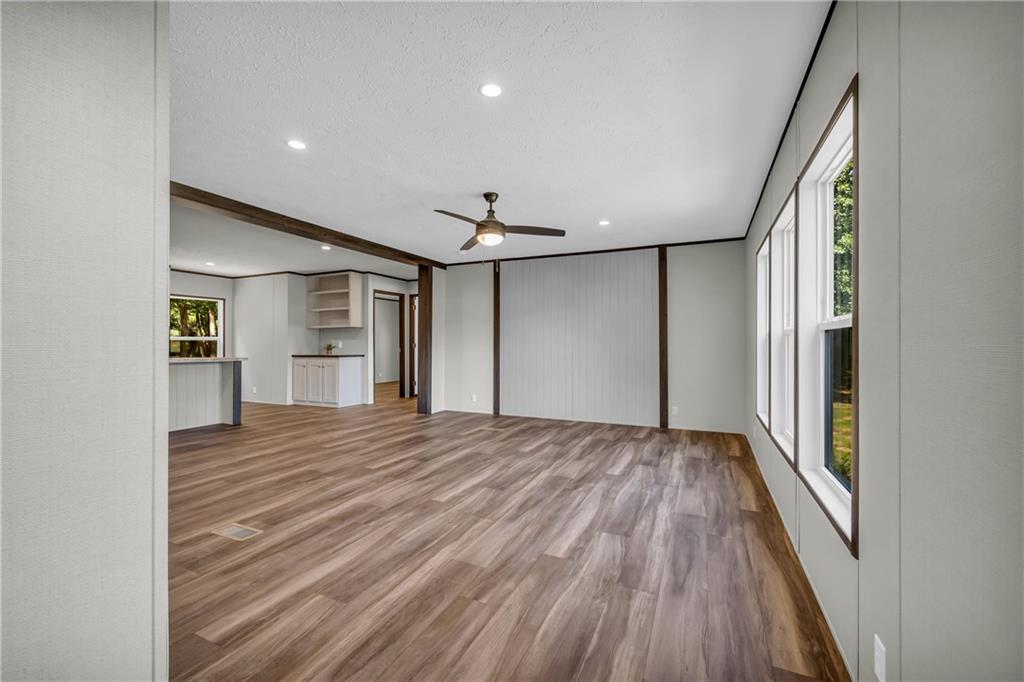 3078 Anderson Highway Hartwell, GA 30643 - Photo 4 of 37 a view of empty room with wooden floor and fan