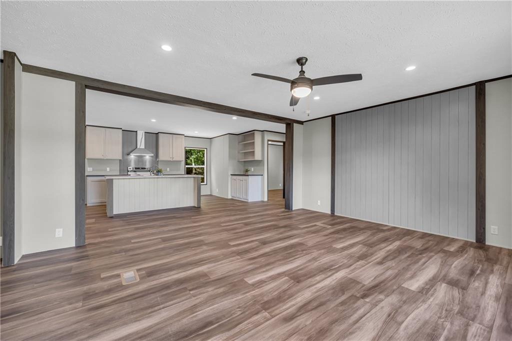 3078 Anderson Highway Hartwell, GA 30643 - Photo 5 of 37 a view of a kitchen with a dishwasher and a refrigerator