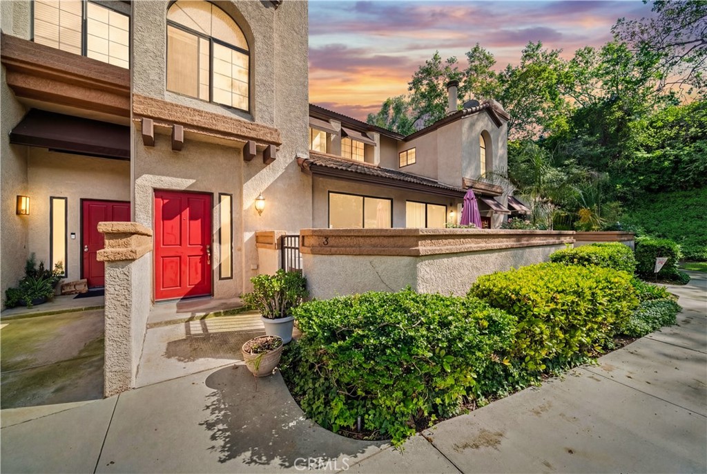 front view of a house with a street