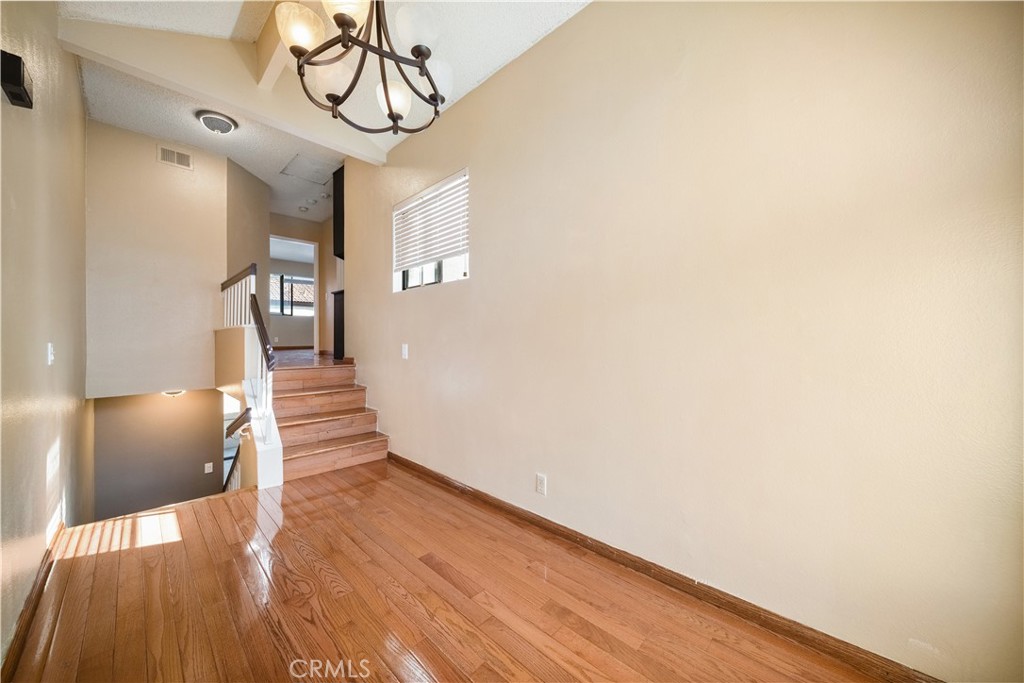 3 Saddlewood Lane Pomona, CA 91766 - Photo 19 of 40 a view of entryway with wooden floor