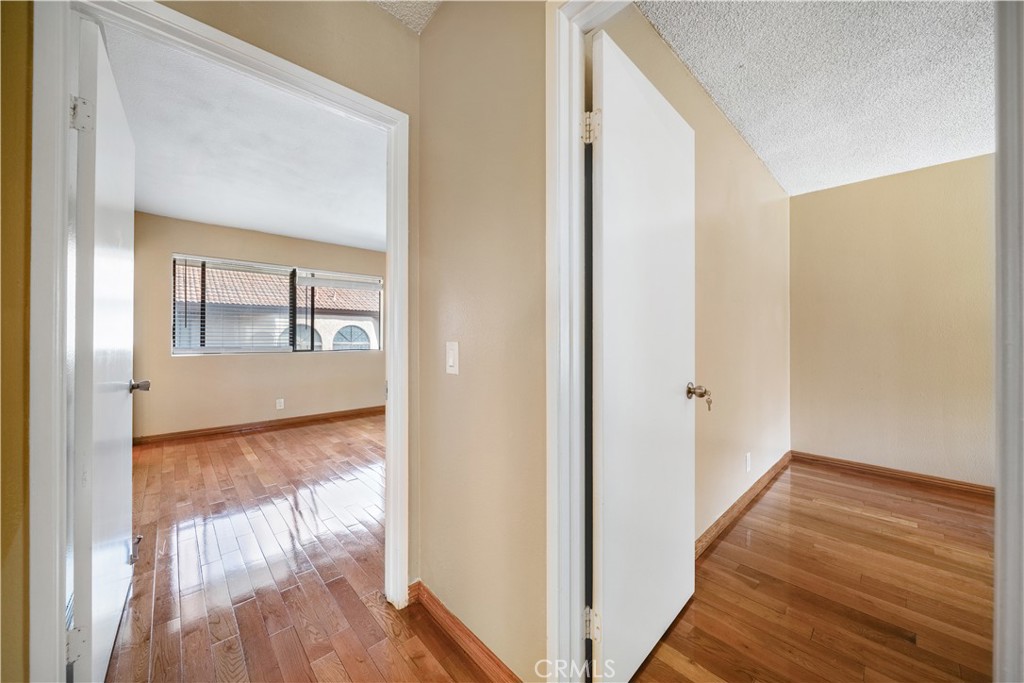 3 Saddlewood Lane Pomona, CA 91766 - Photo 20 of 40 a view of wooden floor in an empty room