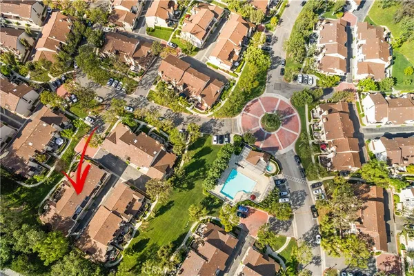 an aerial view of a multi story residential apartment building