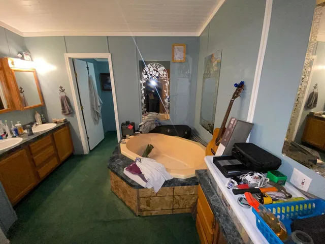 a room with furniture and a flat screen tv