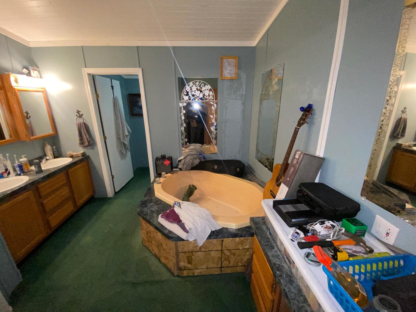 207 South Main Street Fithian, IL 61844 - Photo 12 of 23 a room with furniture and a flat screen tv