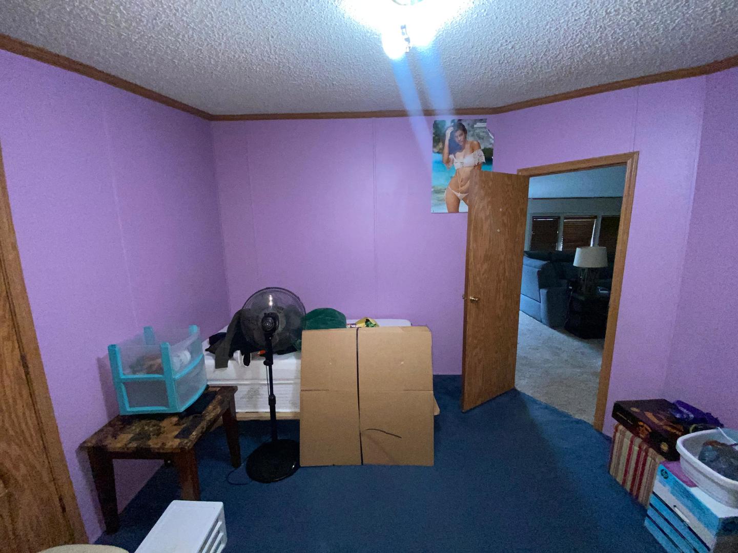 207 South Main Street Fithian, IL 61844 - Photo 6 of 23 a view of a livingroom with furniture and wooden floor
