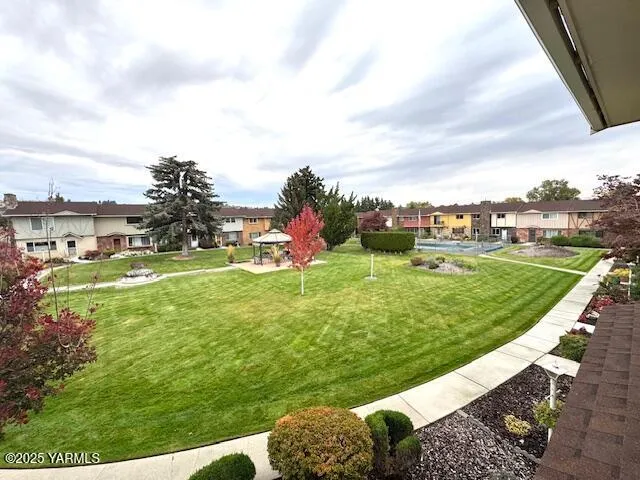 a view of a golf course with street