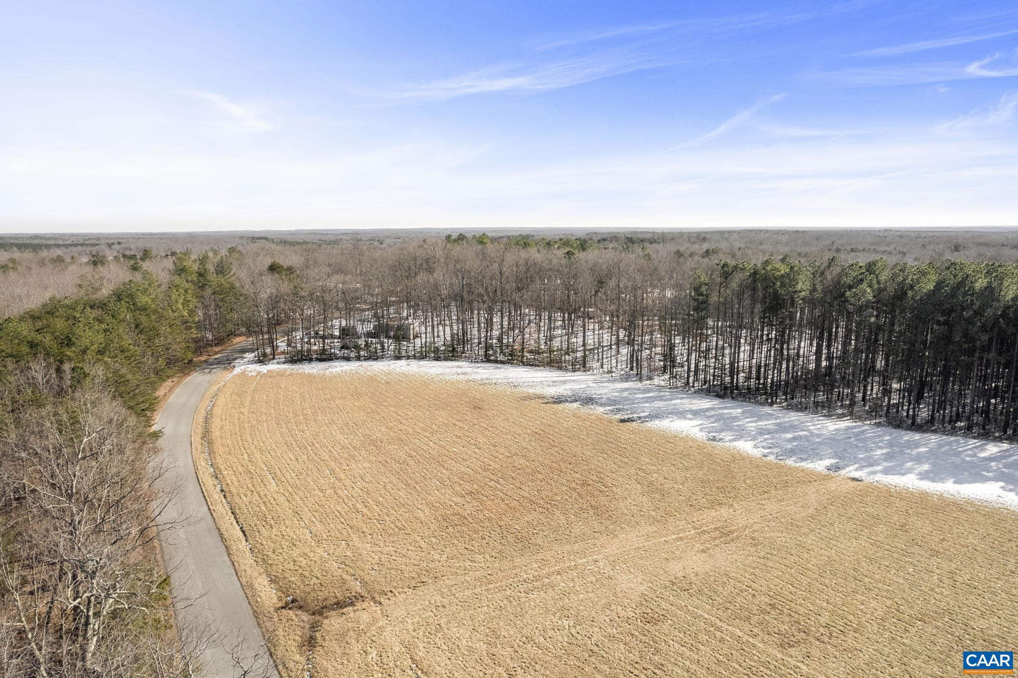 20 Hollands Road Palmyra, VA 22963 - Photo 7 of 25 a view of a swimming pool with a yard and mountain view