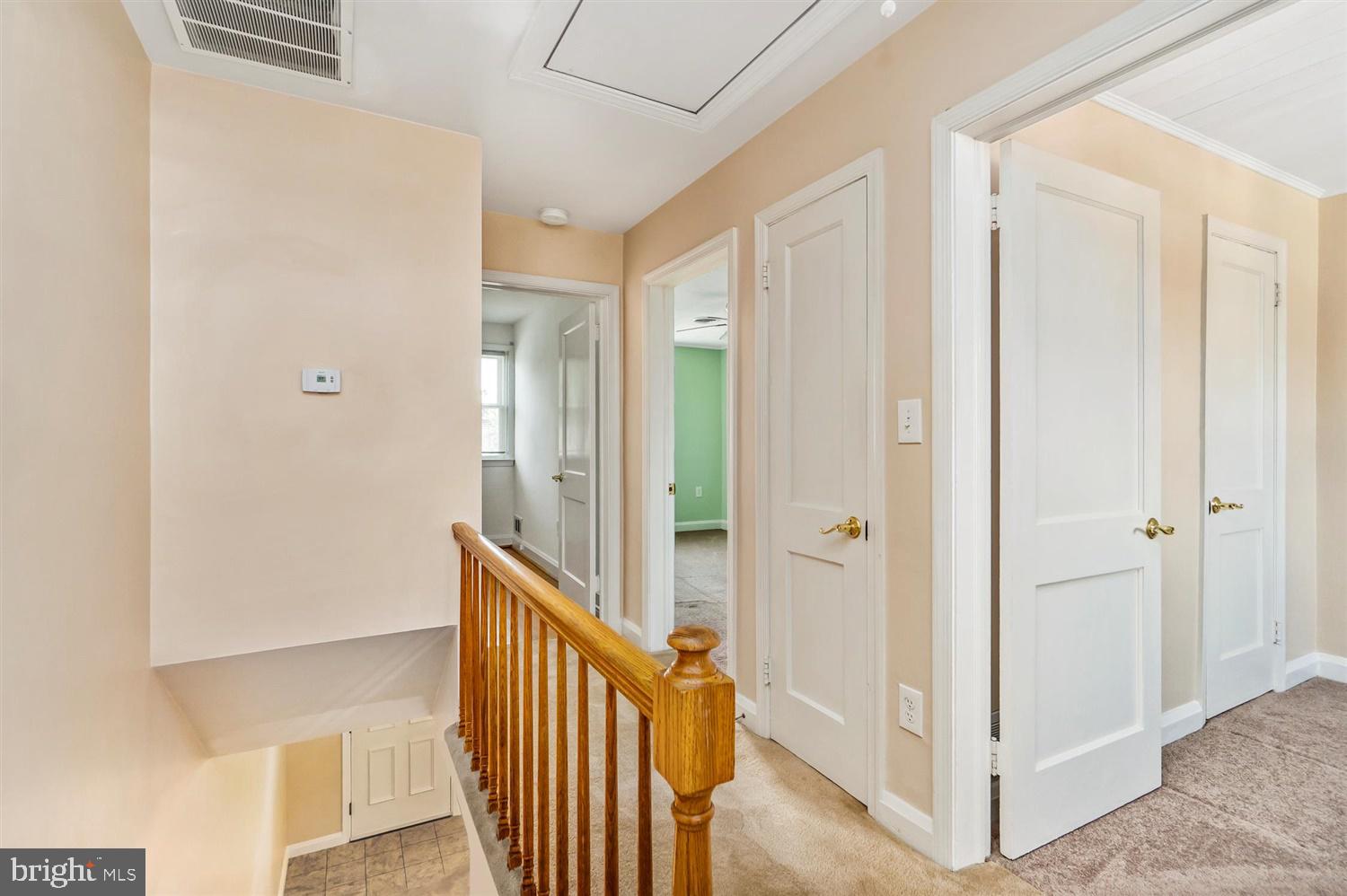 2107 Graythorn Road Baltimore, MD 21220 - Photo 22 of 36 a view of a hallway with wooden floor and entryway