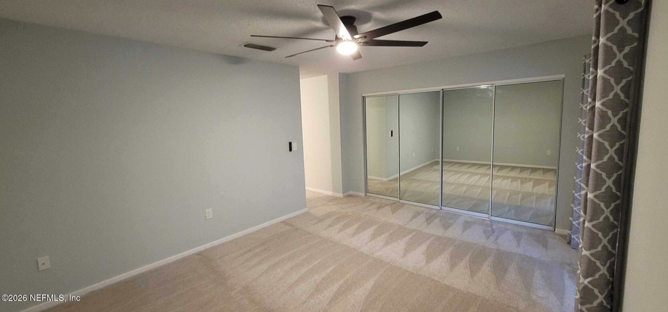 7848 Playa Del Rey Court, Unit 7848 Jacksonville, FL 32256 - Photo 30 of 41 Primary bedroom