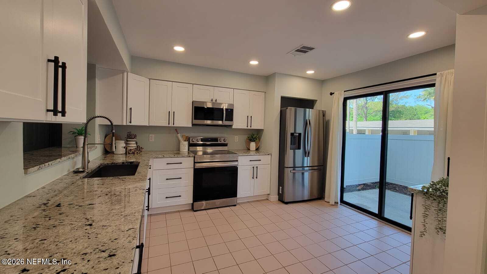 7848 Playa Del Rey Court, Unit 7848 Jacksonville, FL 32256 - Photo 9 of 41 Kitchen 2