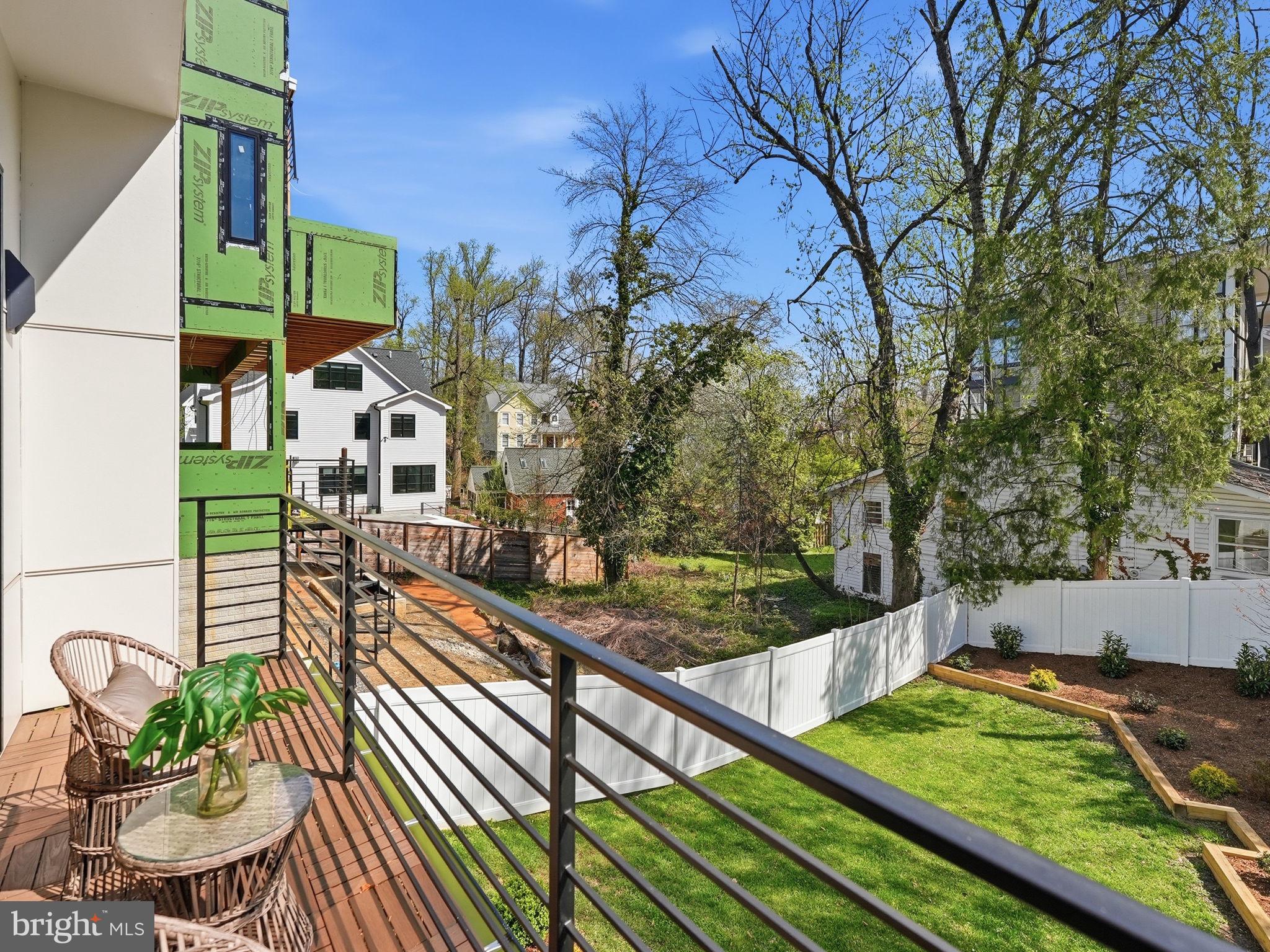 2211 Military Road Arlington, VA 22207 - Photo 102 of 107 Serene balcony with lush green views.