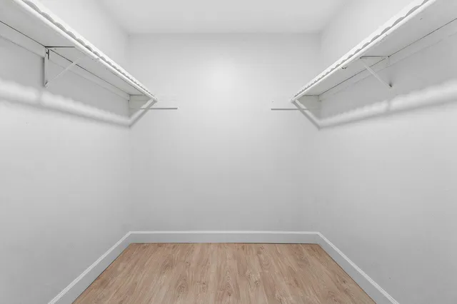 a bathroom with a sink and a large mirror