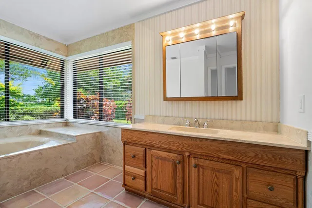 a view of an house with backyard space and garden