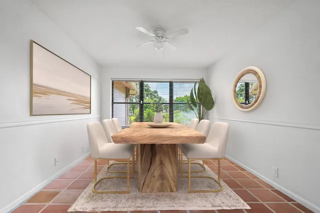 a kitchen with stainless steel appliances a refrigerator and a sink
