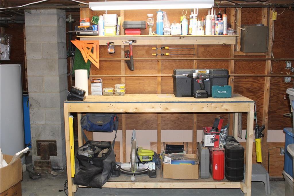 82 Brook Road Portland, ME 04103 - Photo 16 of 21 Workbench space in the basement