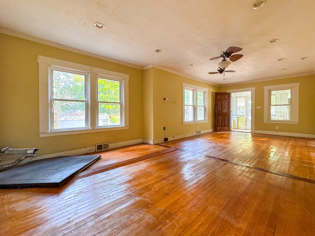 14 Brook Street Ayer, MA 01432 - Photo 14 of 26 a view of a room with gym equipment and windows