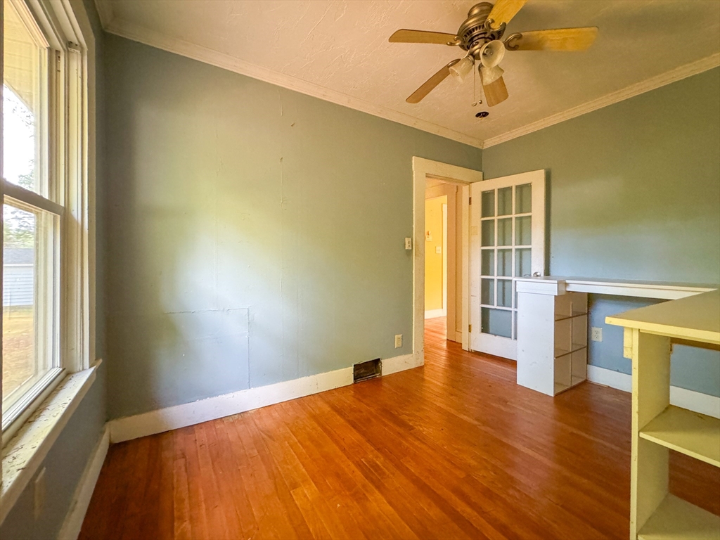 14 Brook Street Ayer, MA 01432 - Photo 16 of 26 a view of empty room with wooden floor and fan