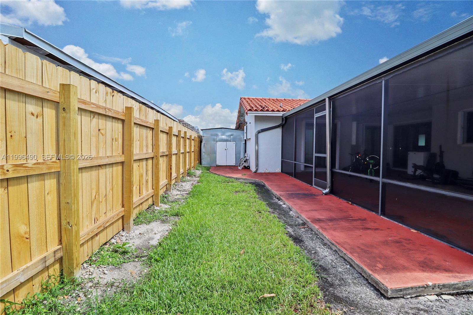 10940 Southwest 143rd Court Miami, FL 33186 - Photo 28 of 31 a view of a backyard