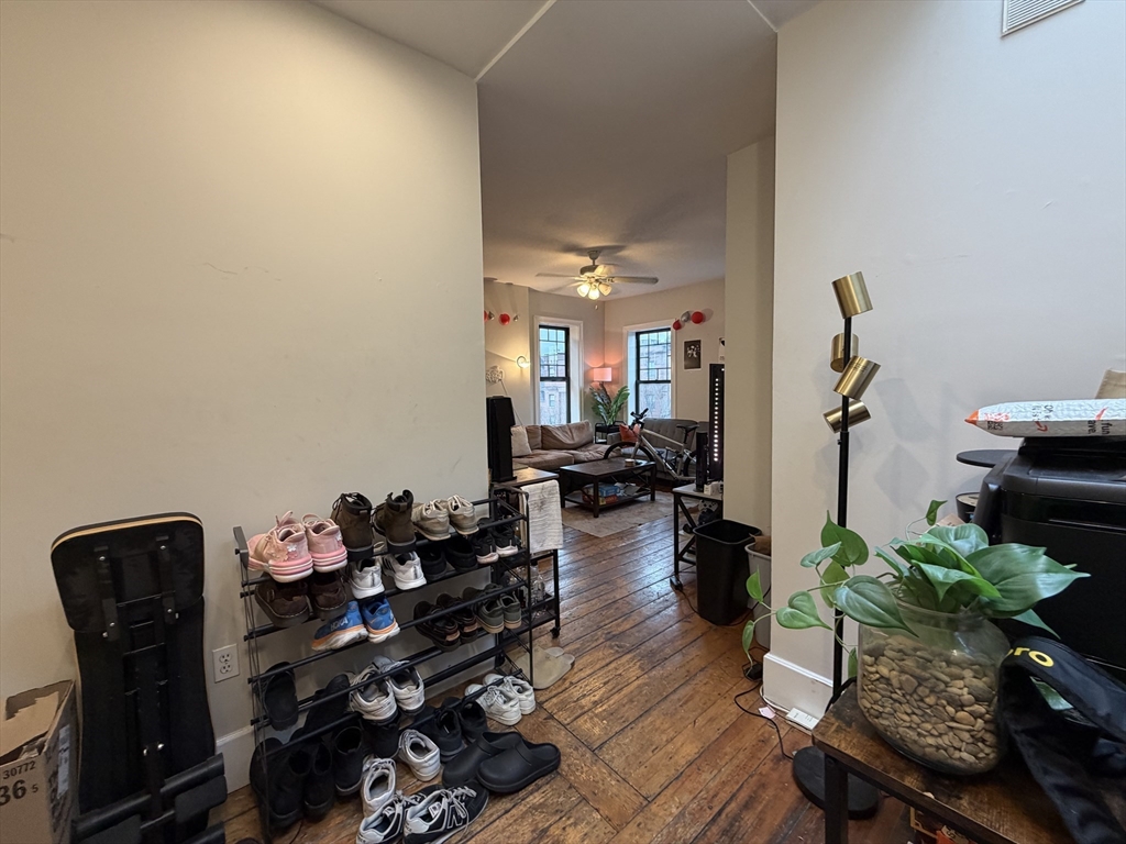 1675 Washington Street, Unit 3 Boston, MA 02118 - Photo 3 of 6 a living room with furniture