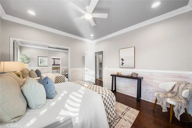 a bathroom with a toilet and a bathtub