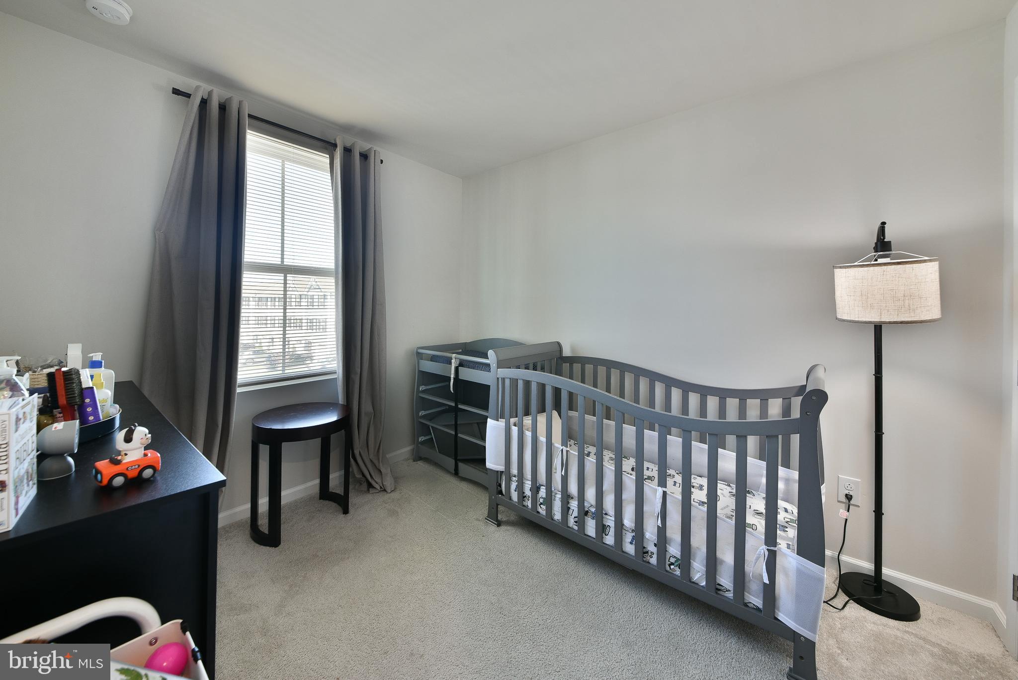 24 Wendowski Street Beverly, NJ 08010 - Photo 13 of 19 a bedroom with furniture and a window