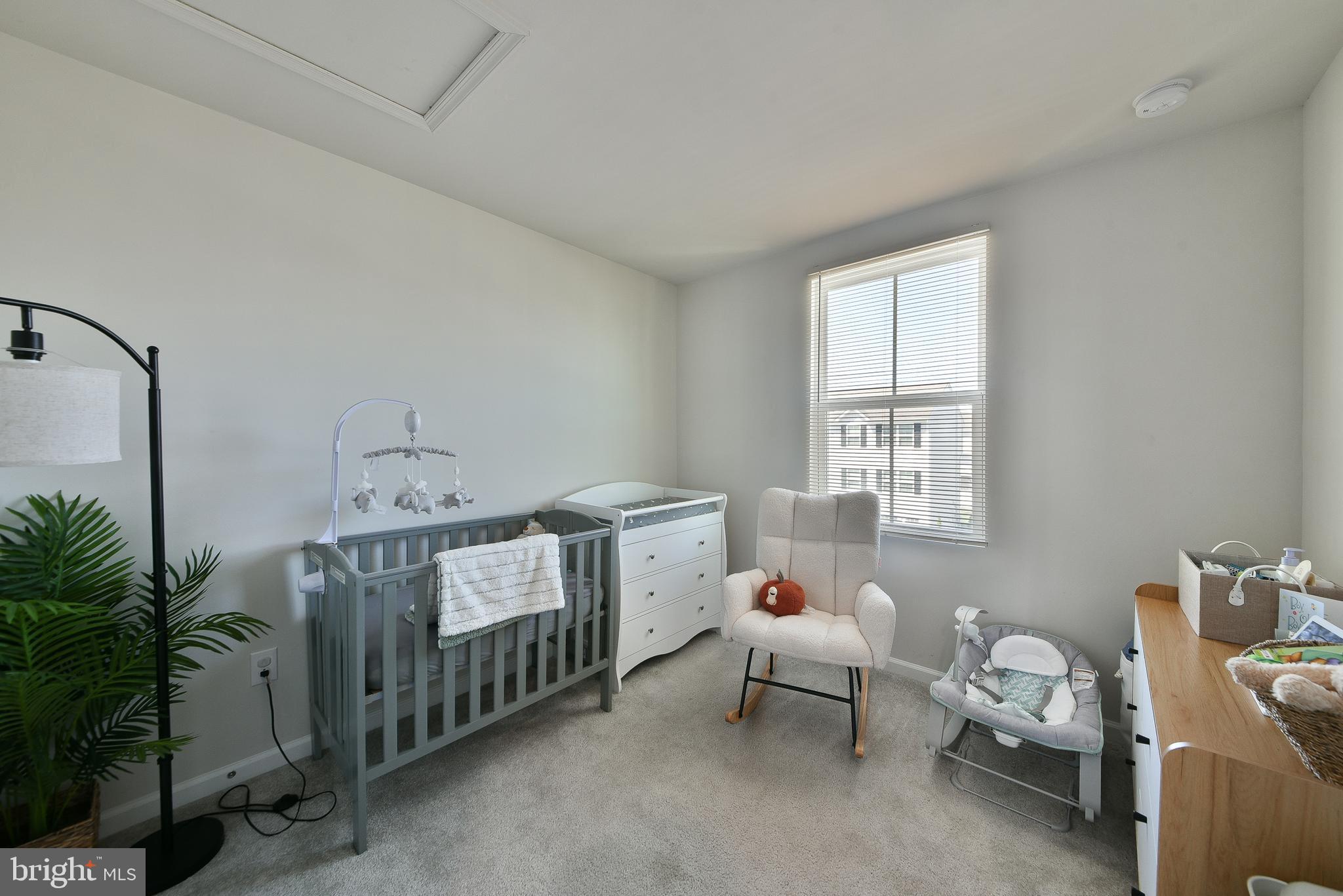 24 Wendowski Street Beverly, NJ 08010 - Photo 14 of 19 a bedroom with a bed and a window