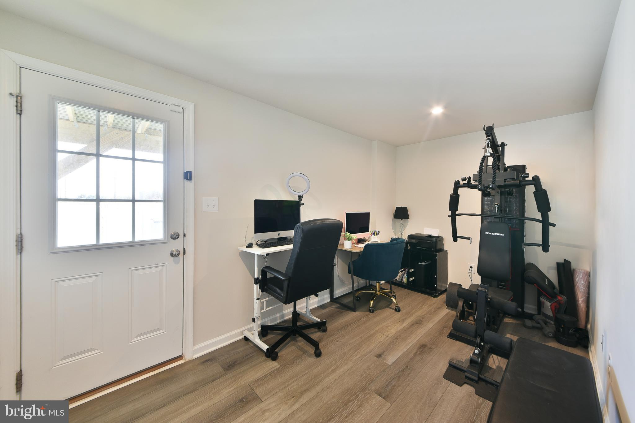 24 Wendowski Street Beverly, NJ 08010 - Photo 16 of 19 a view of workspace with wooden floor windows