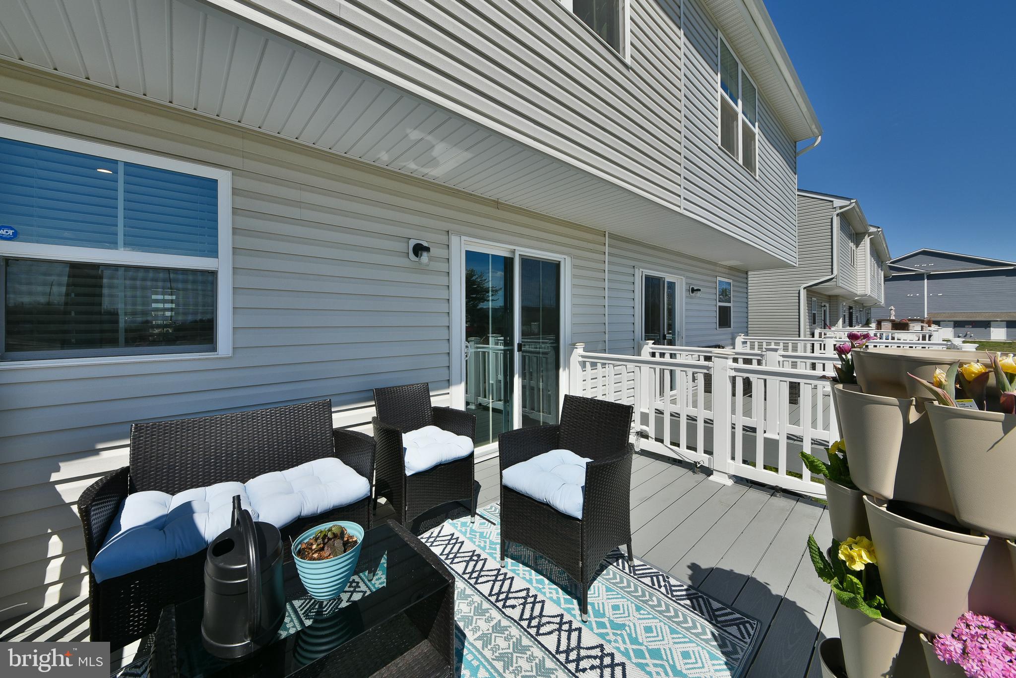 24 Wendowski Street Beverly, NJ 08010 - Photo 18 of 19 a view of a patio filled with furniture