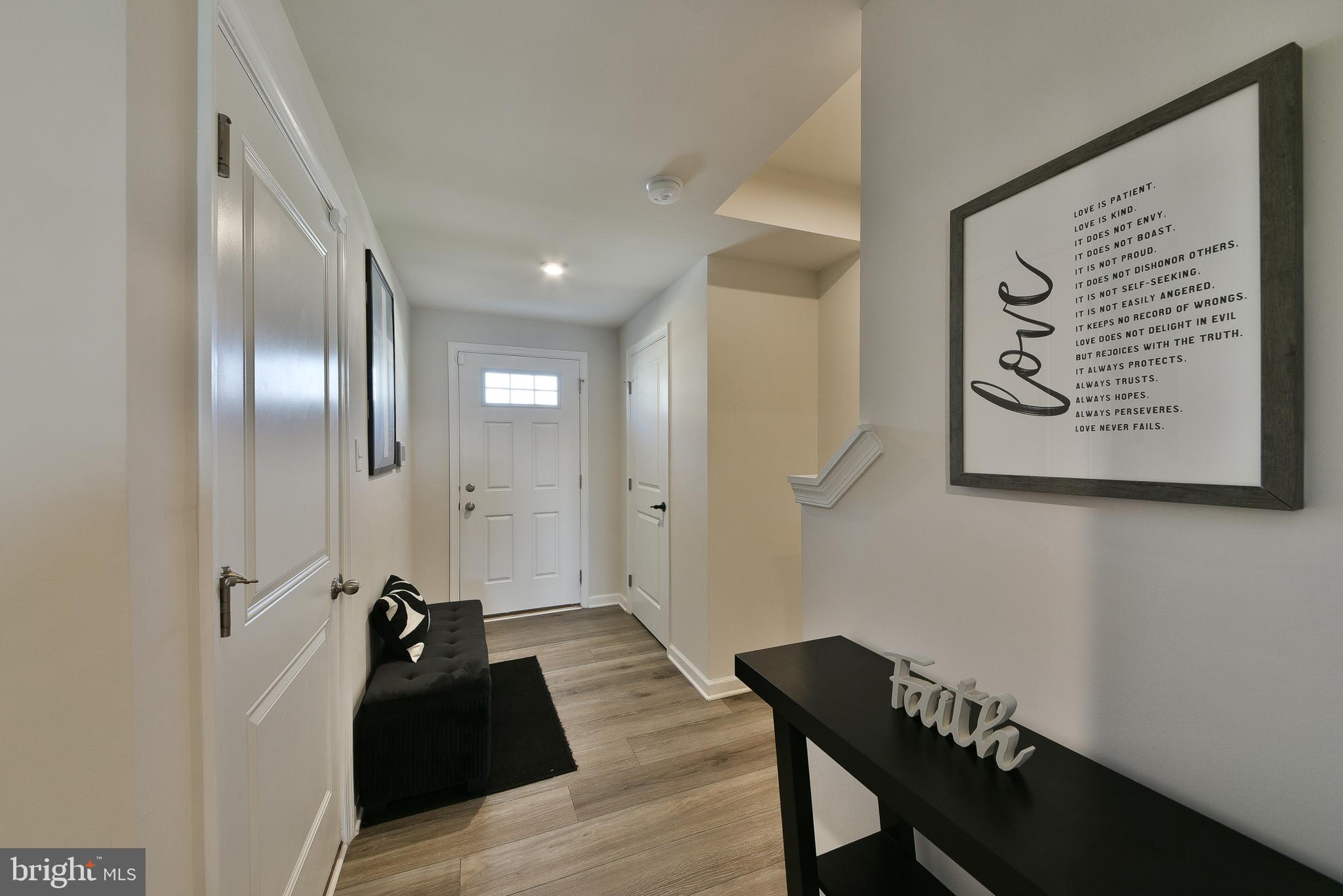 24 Wendowski Street Beverly, NJ 08010 - Photo 3 of 19 a living room with furniture and wooden floor