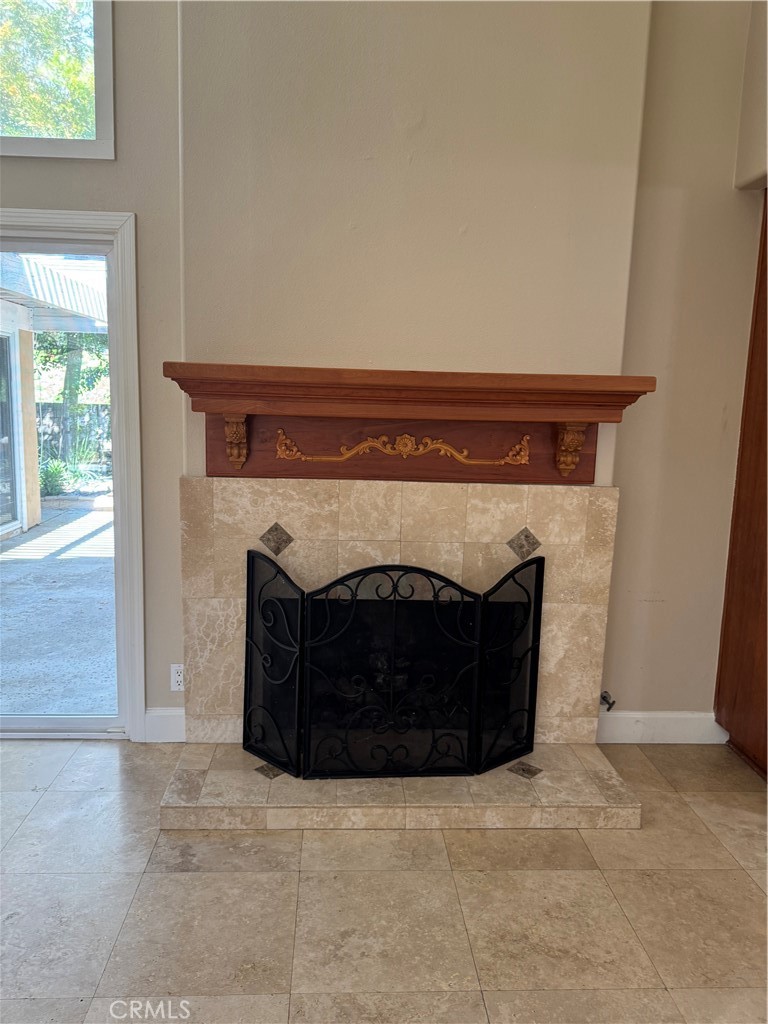 39 Bethany Drive Irvine, CA 92603 - Photo 17 of 37 a living room with a fireplace